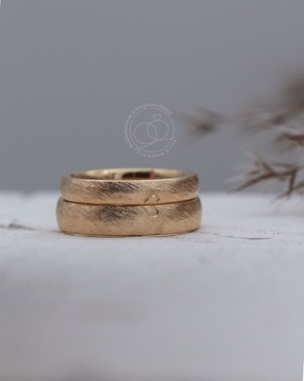 Herz Trauringe Gold mit Herzhälften Zweisam